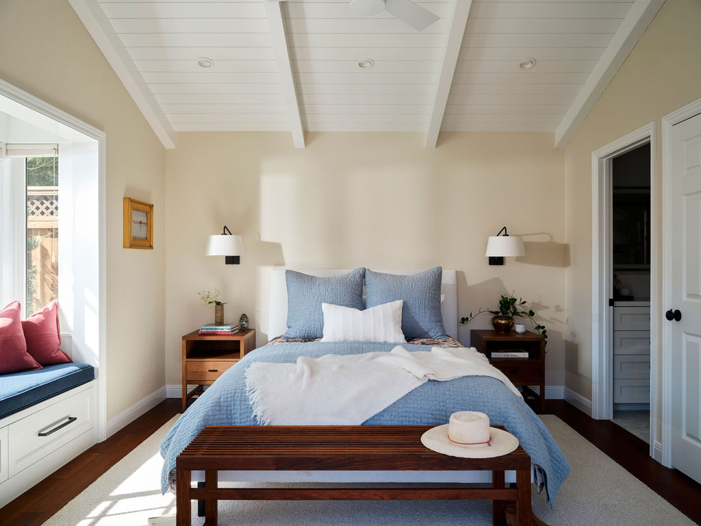 adu bedroom with vaulted ceiling and built in window seat by mak design build in davis ca