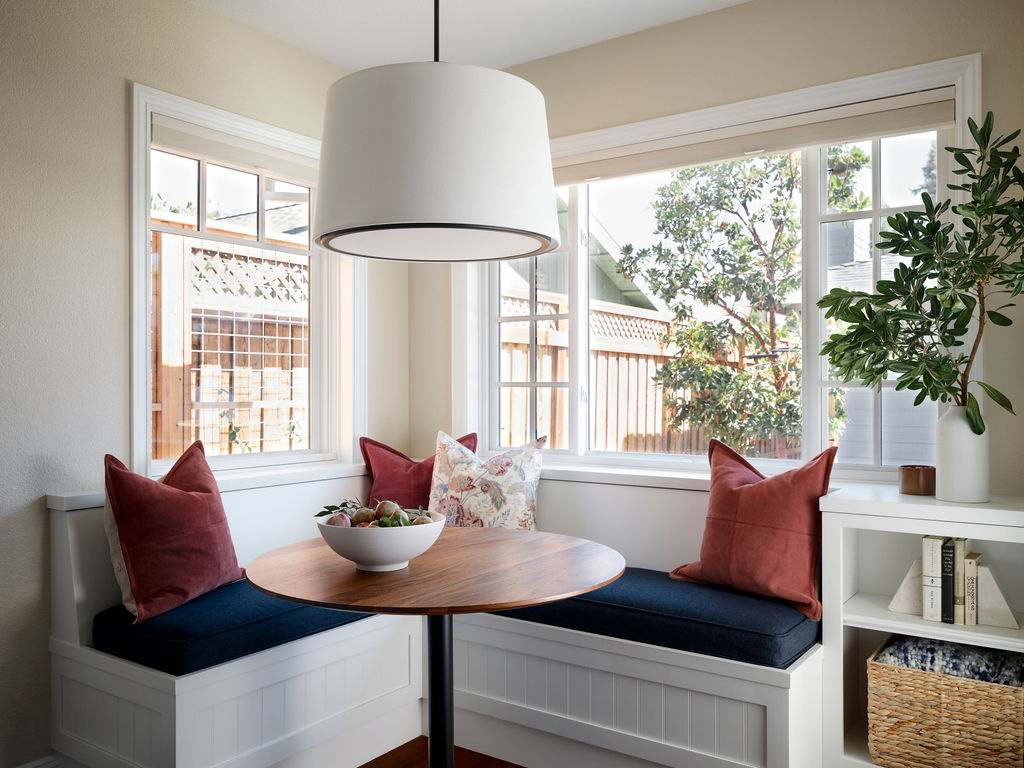 adu breakfast nook with round table and built in banquette by mak design build in davis ca