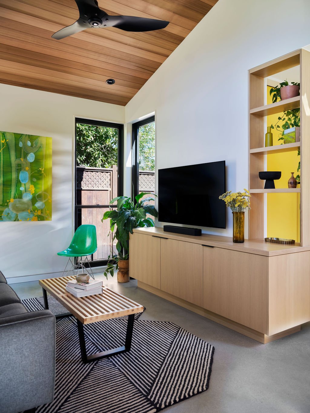 Contemporary ADU Living Room with Pass Through Shelving