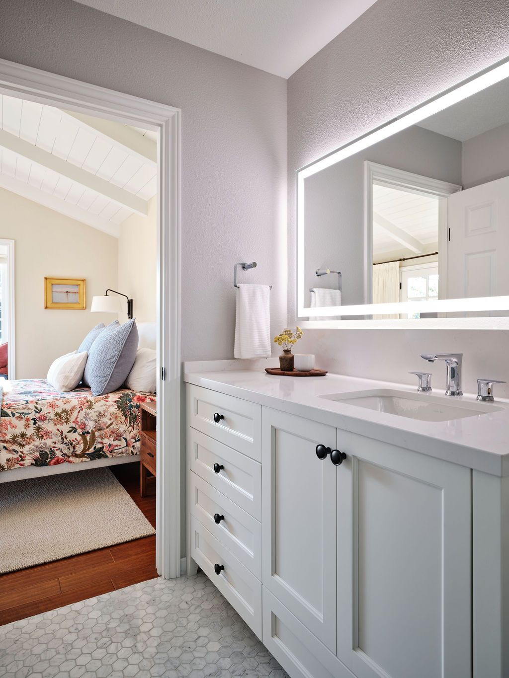 adu bathroom vanity with white cabinets and illuminated mirror by mak design build in davis ca