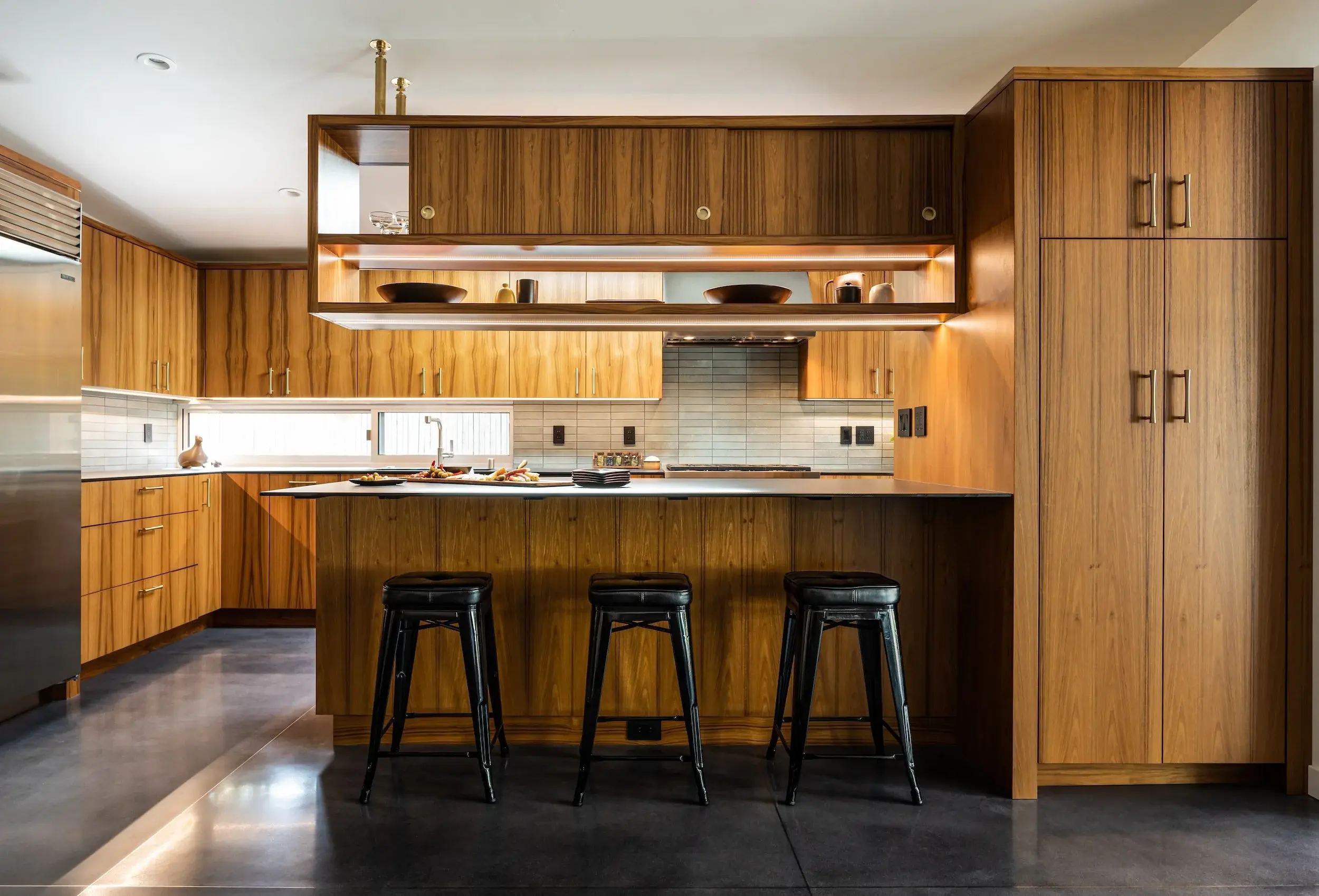 TEAK+CABINETRY+POLISHED+CONCRETE+FLOATING+SHELF