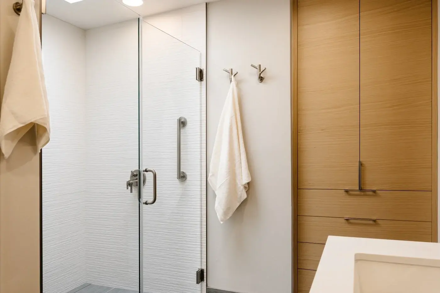 White+Walk-In+Shower+with+Rift-Cut+White+Oak+Cabinetry