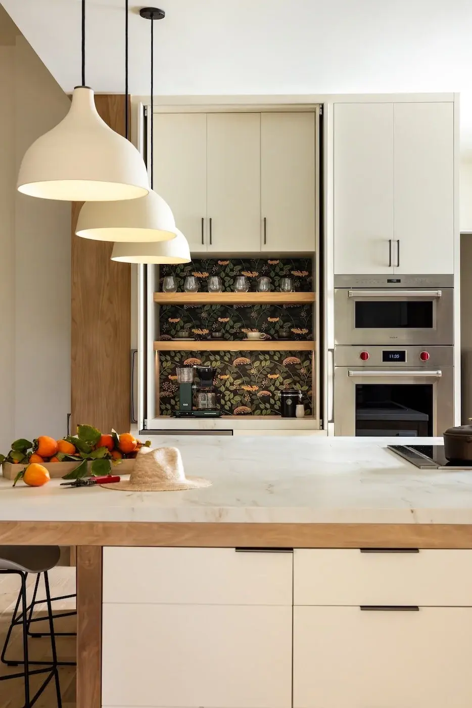 warm+white+cabinetry+hidden+bar+open-1